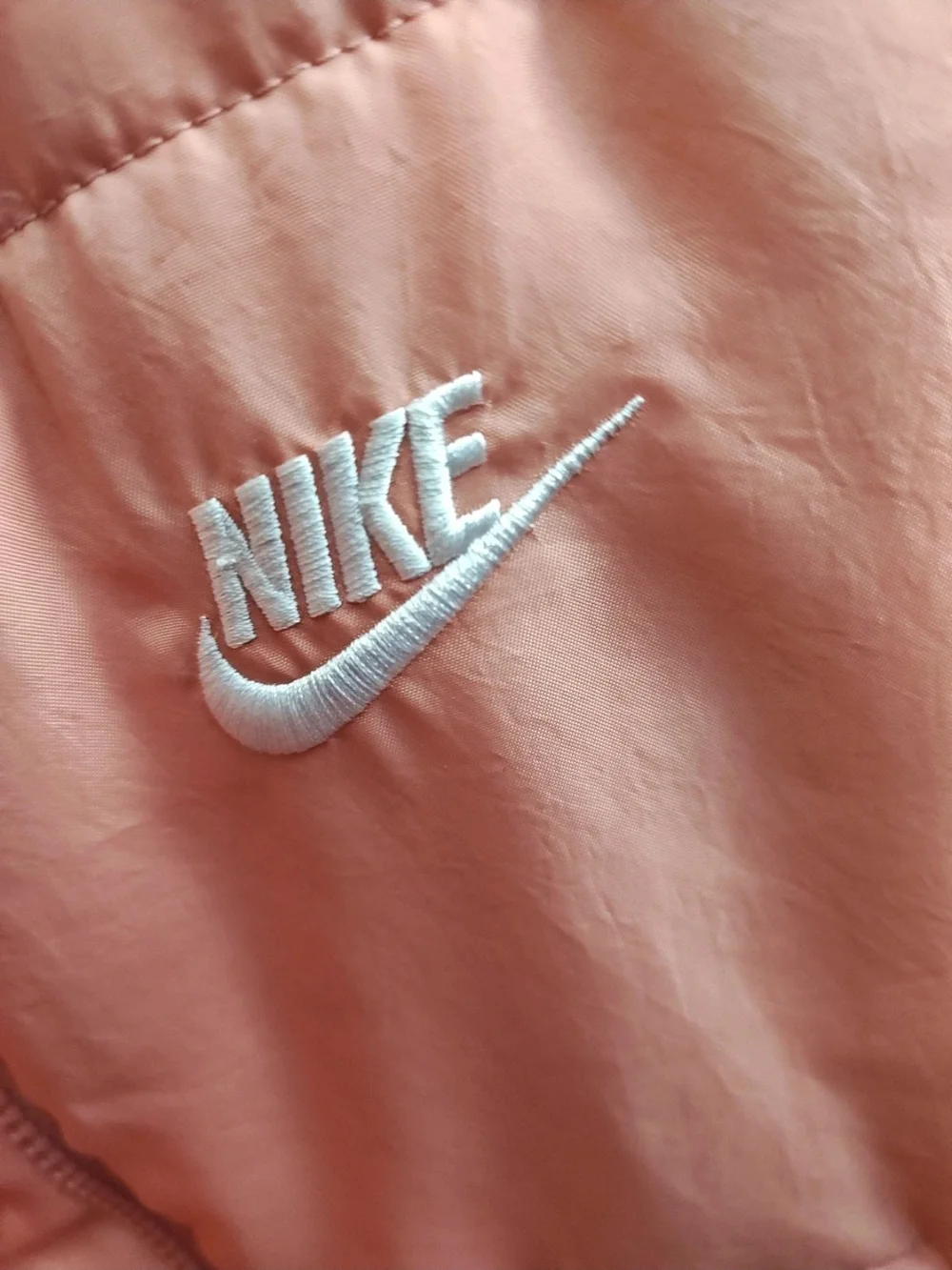 Nike Quilted Sleeveless Vest in Dusty Peach
